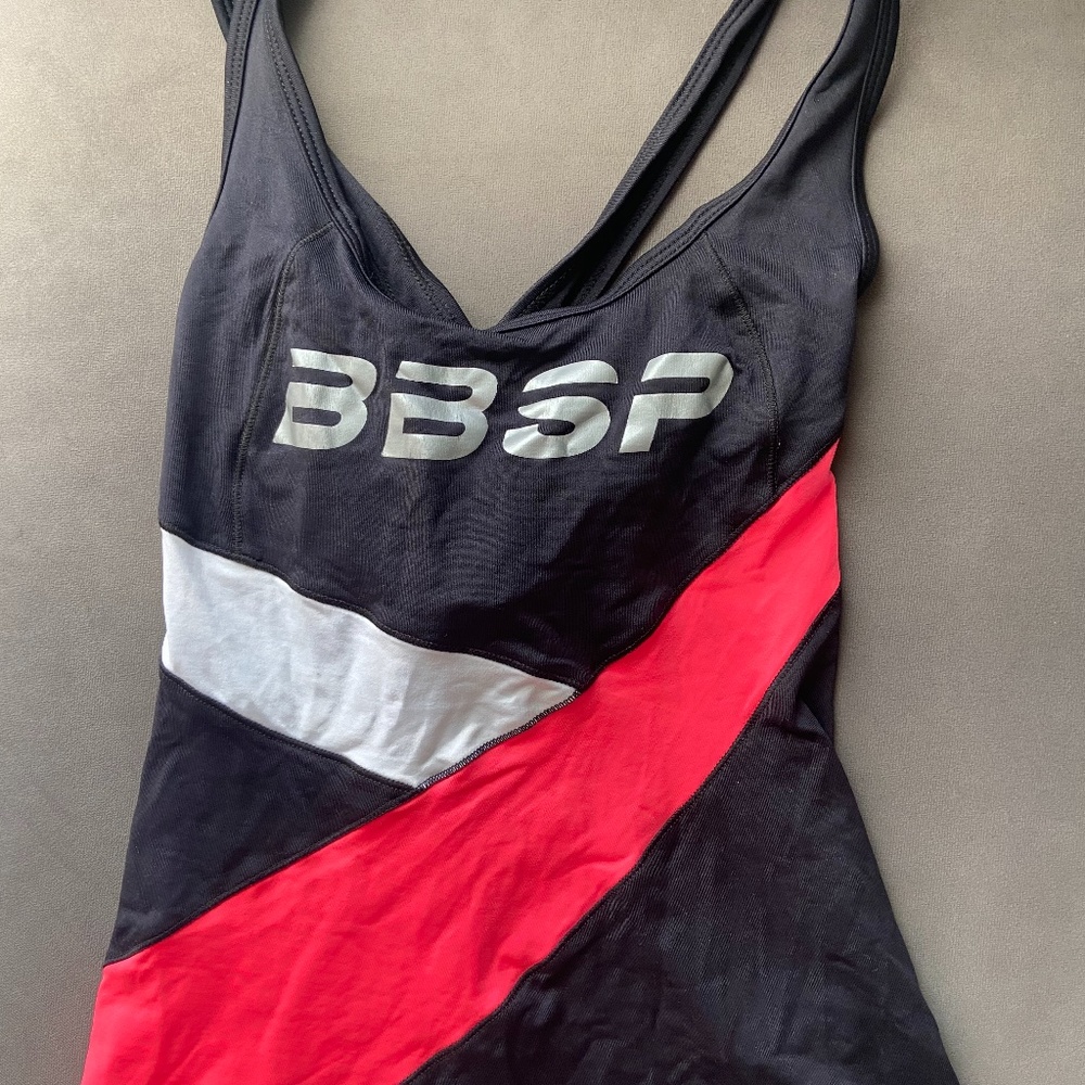 BRAND NEW UNWORN OUT OF PRODUCTION BEBE SPORTS TOP